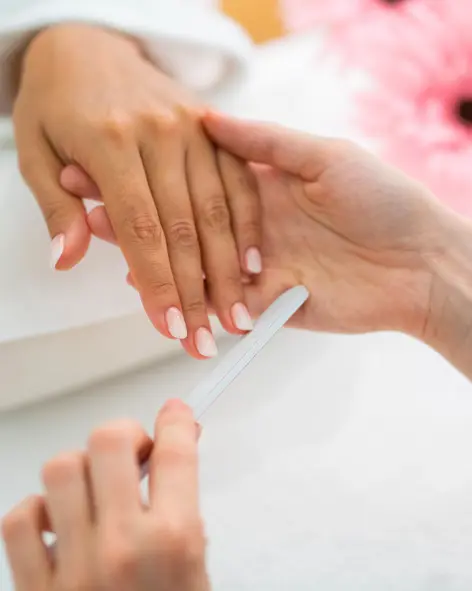 Woman hand manicure Splash and Spa Tamaro